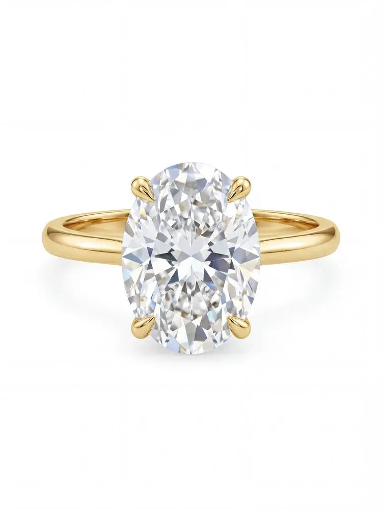 Harmony Ring featuring a large oval-cut diamond set in a sleek, polished yellow gold band, showcasing a timeless and elegant design perfect for sophisticated fine jewelry lovers.